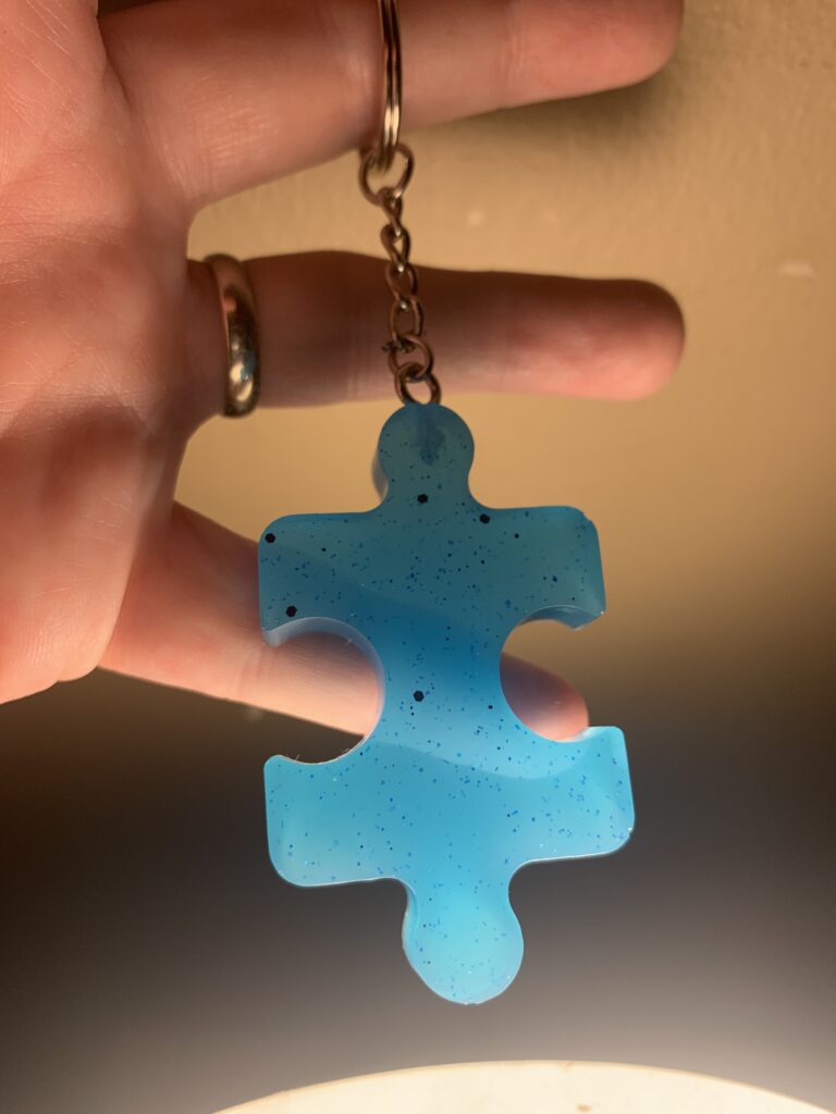 Blue Puzzle Piece Keychain will be the flagship item of the resin portion of the shop. A portion of every one of these sold will get donated to a local charter school that focuses on children with Autism.